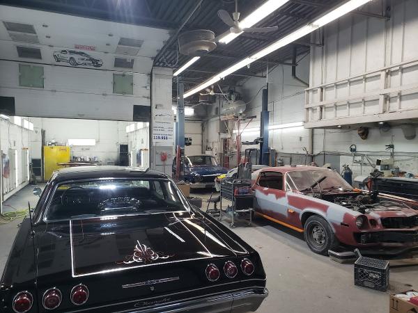 SLM Auto INC Débosselage & Peinture